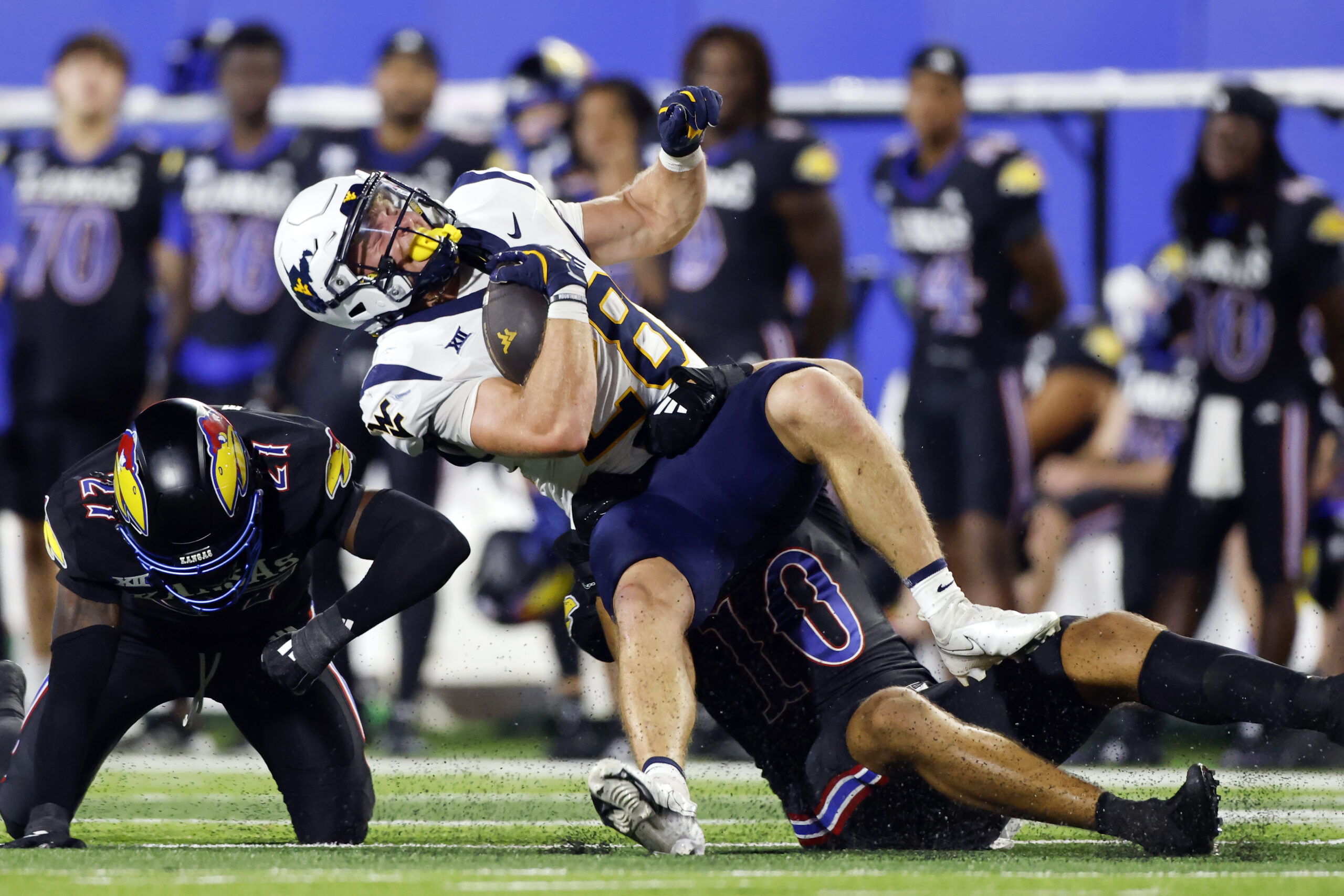 Kansas plows past WVU, 41-10, in Big 12 opener